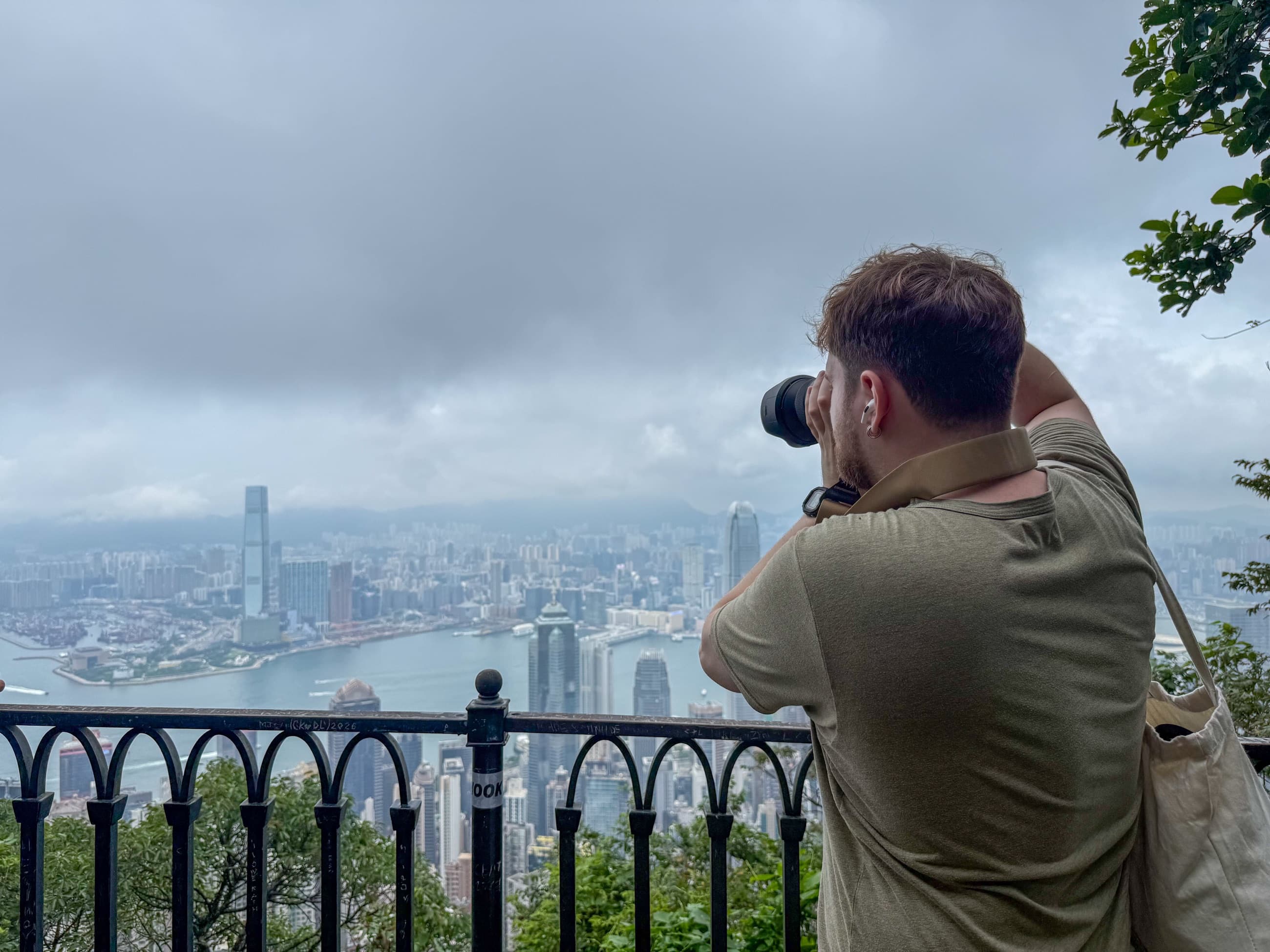 Jakub photographing the Hong Kong skyline from Victoria Peak